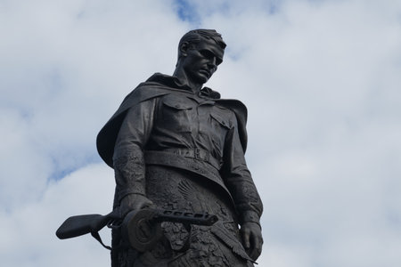 Russia, Tver Region - October 2022. Rzhevsky Memorial Soviet soldier. Beautiful sad monument to Russian warrior died in World War II. Weapons in hands and cranes fly away.のeditorial素材