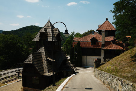 Traditional architecture in Mokra Gora with wooden and stone houses by the railway, Serbia countryの写真素材