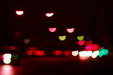 Bokeh blur of car lights on street at night.の写真素材