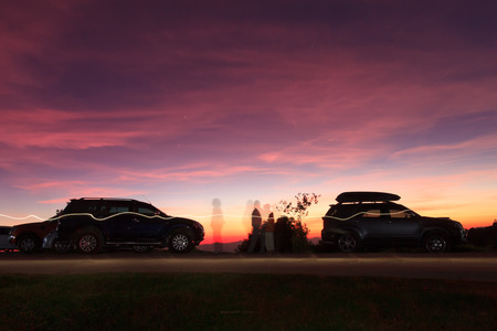 Spectacular vivid purple sunset over HuenamdangForest peaks in a beautiful landscapeの写真素材