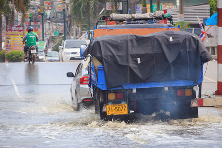 Samut Prakan, Thailand August 27, 2014: There was flooding on the street near the market in Bang Pu Industrial Estate after a very heavy rain.のeditorial素材
