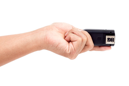 Wireless Flash Trigger in hand, Isolate on white backgroundの写真素材