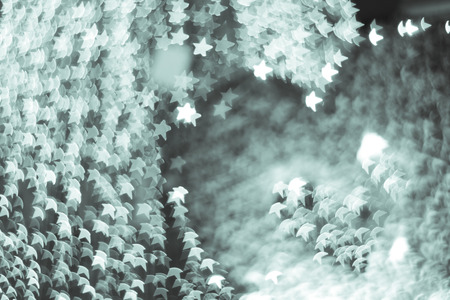 Defocused christmas lights on soft colors toneの写真素材