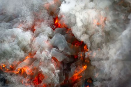 Fire under heavy smokeの写真素材