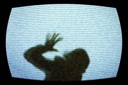 Ghost try to come out from tvの写真素材