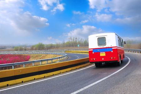 Recreation vehicle in a curve on the highway
