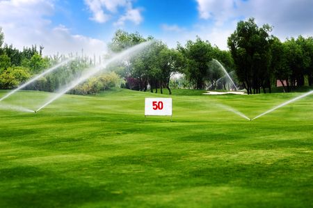 Golf course watering の写真素材