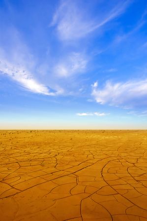 Dry crack field at sunset timeの写真素材