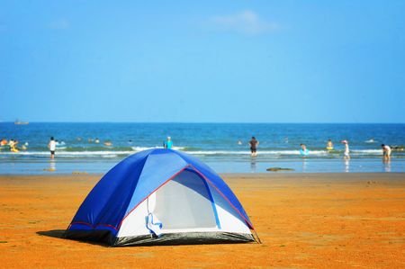 Tent on seashore in the morningの写真素材
