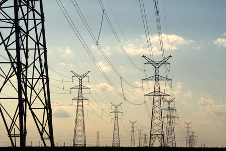 High voltage power pylons back lit