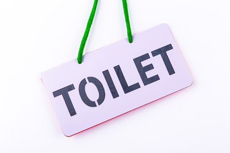 toilet signboard on white background.の写真素材
