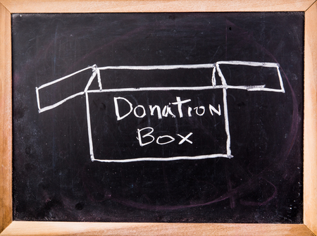 donation box  on blackboardの写真素材