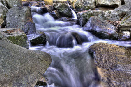 waterfall snaking through rocks
