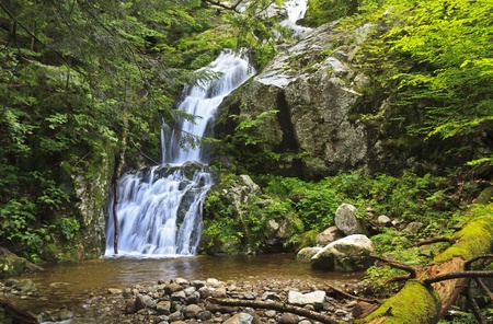 The Wedge Brook falls more than 50' into a pool at Upper Wedge Brook Falls above the Ausable River in the Adirondack State Park in New Yorkの写真素材