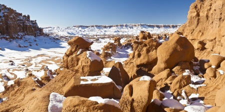 Panoramic image of a snowy canyon in Goblin Valley State Park, Utahの写真素材