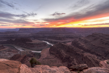 Colorful Utah sunset from Dead Horse Point State Park, overlooking the Canyons of the Colorado River.の写真素材