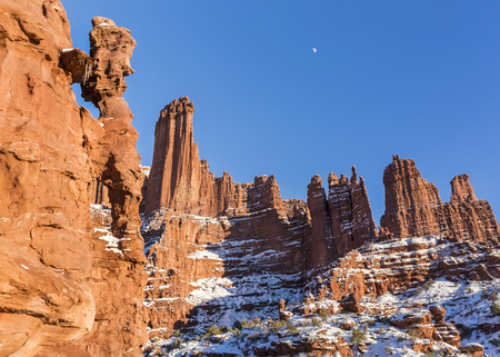 The Titan Tower and jug handle arches, part of the Fisher Towers rock formations near Moab, Utahの写真素材