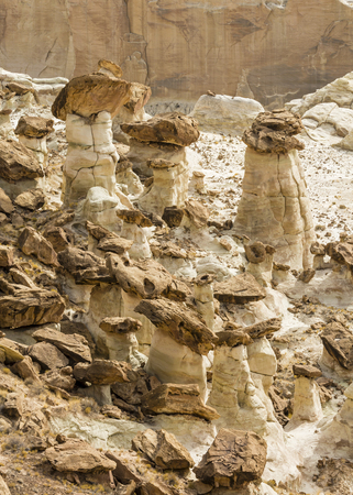 Brown, white and red layers of Entrada sandstone mix and create strage hoodoos at the Rimrocks area of Grand Staircase Escalante National Monument, Utah.の写真素材