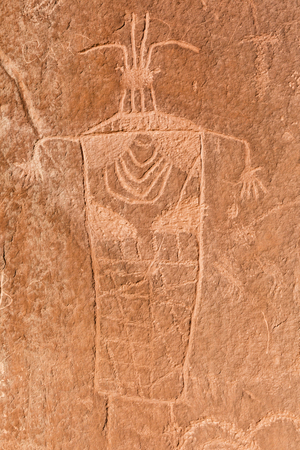Pre-Columbian Anthropomorphic petrogyphs on the cliffs on the Escalante River Canyon in Grand Staircase Escalante National Monument, Utah.の写真素材