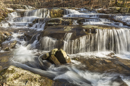 A multi-tiered waterfalls on Stony Clove Creek in Greene Country in the Catskill Mountains in Edgewood, New Yorkの写真素材