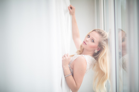 Gorgeous bride on her wedding day (color toned image; shallow DOF)の写真素材