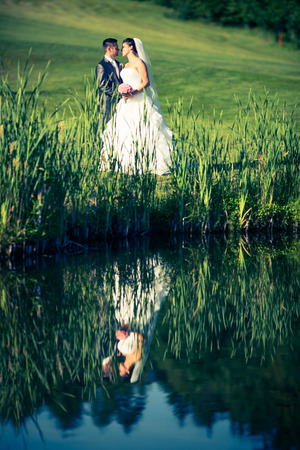 Portrait of a young wedding couple on their wedding dayの写真素材