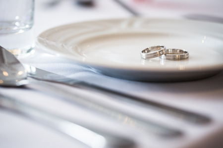 Two splendid wedding rings on a wedding day. Love concept.の写真素材