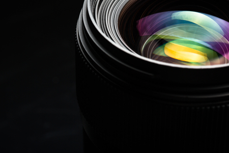 Professional modern DSLR camera llense ow key image - Modern DSLR camera lense with a very wide apertureの写真素材
