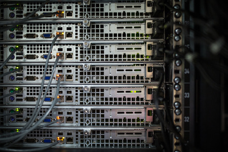 Server rack cluster in a data center (shallow DOF; color toned image)