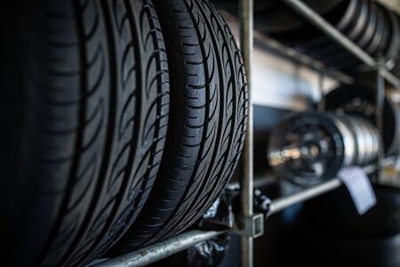 Tyres being stored in a garage - waiting for the client to have them put on his carの写真素材