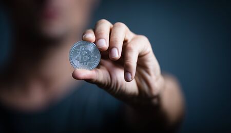 Bitcoin - Cryptocurrency concept - cryptocurrency being held as a value conserving asset as well a...