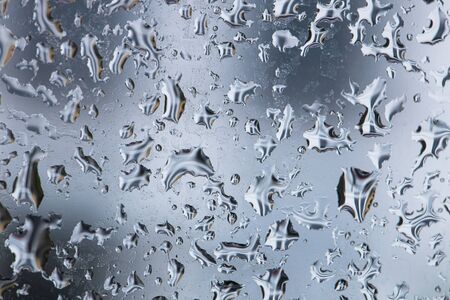 Water Drops On Window. Texture of glass with drops of water on a winter day. texture of macro water...