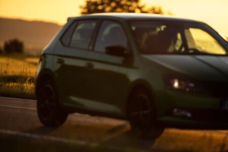 Cars on the road at sunset. Car. Travel. Road trip. Car rental.の写真素材