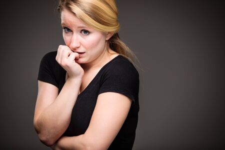 Fear/anxiety/regret/uncertainty in a young woman - effects of a difficult life situation - vivid...