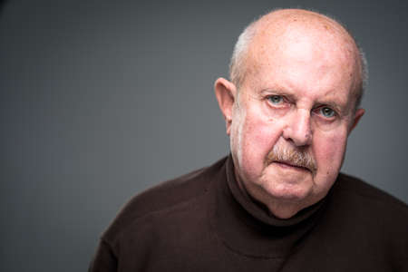 Senior man lonely at home, anxious/afraid to go out - self isolation/ quarantine due to COVID-19/...