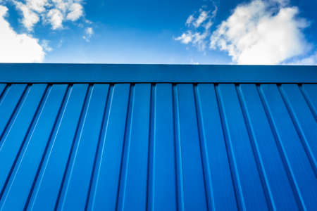 Blue metallic wall - modern background for design, blue grunge background