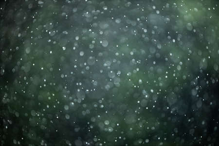 Rain falling from the sky, bringint the very needed humidity to the natureの写真素材