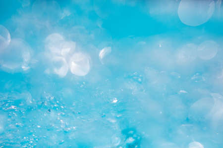 Beautiful water waves -  Splashed water wave in clean blue water, clean filtered water ready for drinkingの写真素材