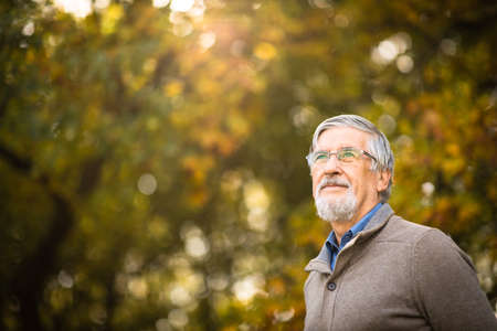 Portrait of a senior man outdoors, optimism, good health, happyness radiates of the man's face, expressionの写真素材