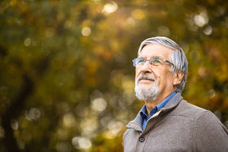 Portrait of a senior man outdoors, optimism, good health, happyness radiates of the man's face, expressionの写真素材