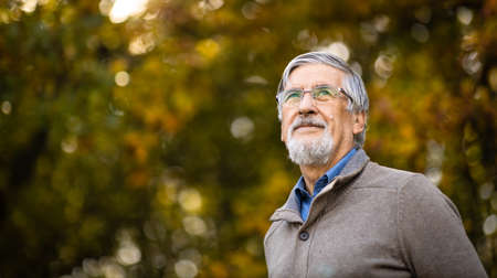 Portrait of a senior man outdoors, optimism, good health, happyness radiates of the man's face, expressionの写真素材