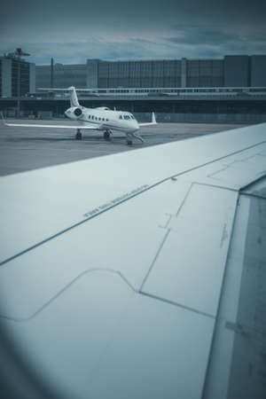 Private jet waiting for its busy owner, ready for flight, in an airportの写真素材