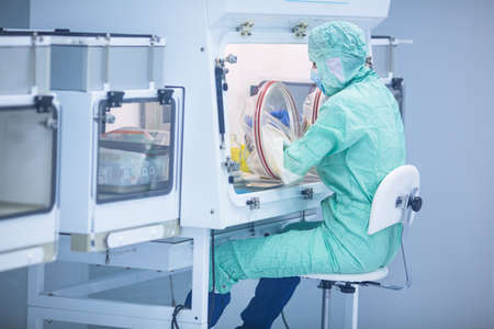 Pharmaceutical industry factory and production laboratory (color toned image; shallow DOF), vaccine production conceptの写真素材