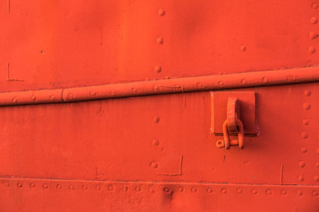 Grungy red texture, old surface of metal boat, abstract background.の写真素材