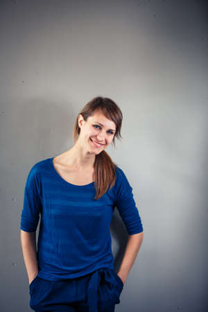 Confident young woman in casual clothing with copy space. Successful smiling womanの写真素材