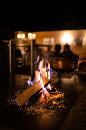 Open fireplace in a cosy restaurantの写真素材
