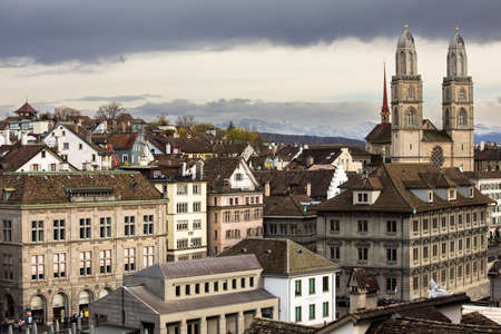 Beautiful panoramic view of historic city center of Zurich with famous Grossmunster Church.のeditorial素材