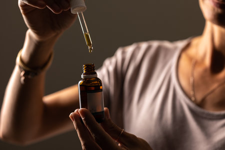 CBD cannabis droplet dosing and biological and ecological hemp plant herbal phaの写真素材