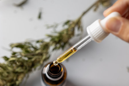CBD cannabis droplet dosing and biological and ecological hemp plant herbal pharmaの写真素材