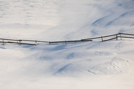 Snowy winter day scenic landscape with tols of snowの写真素材